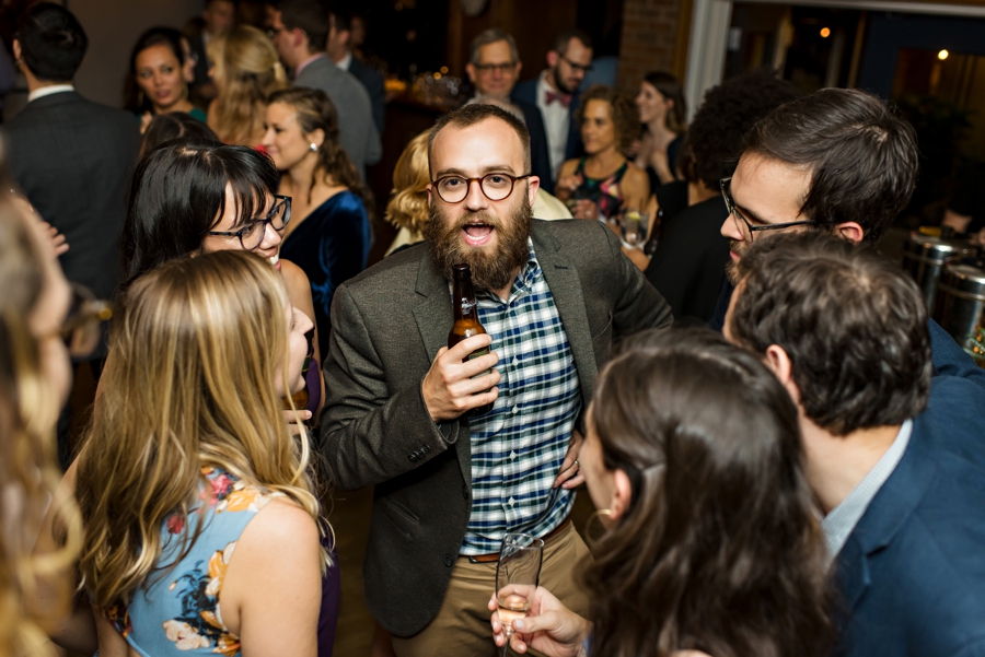 A bunch of friends dancing at a wedding reception in Philly.